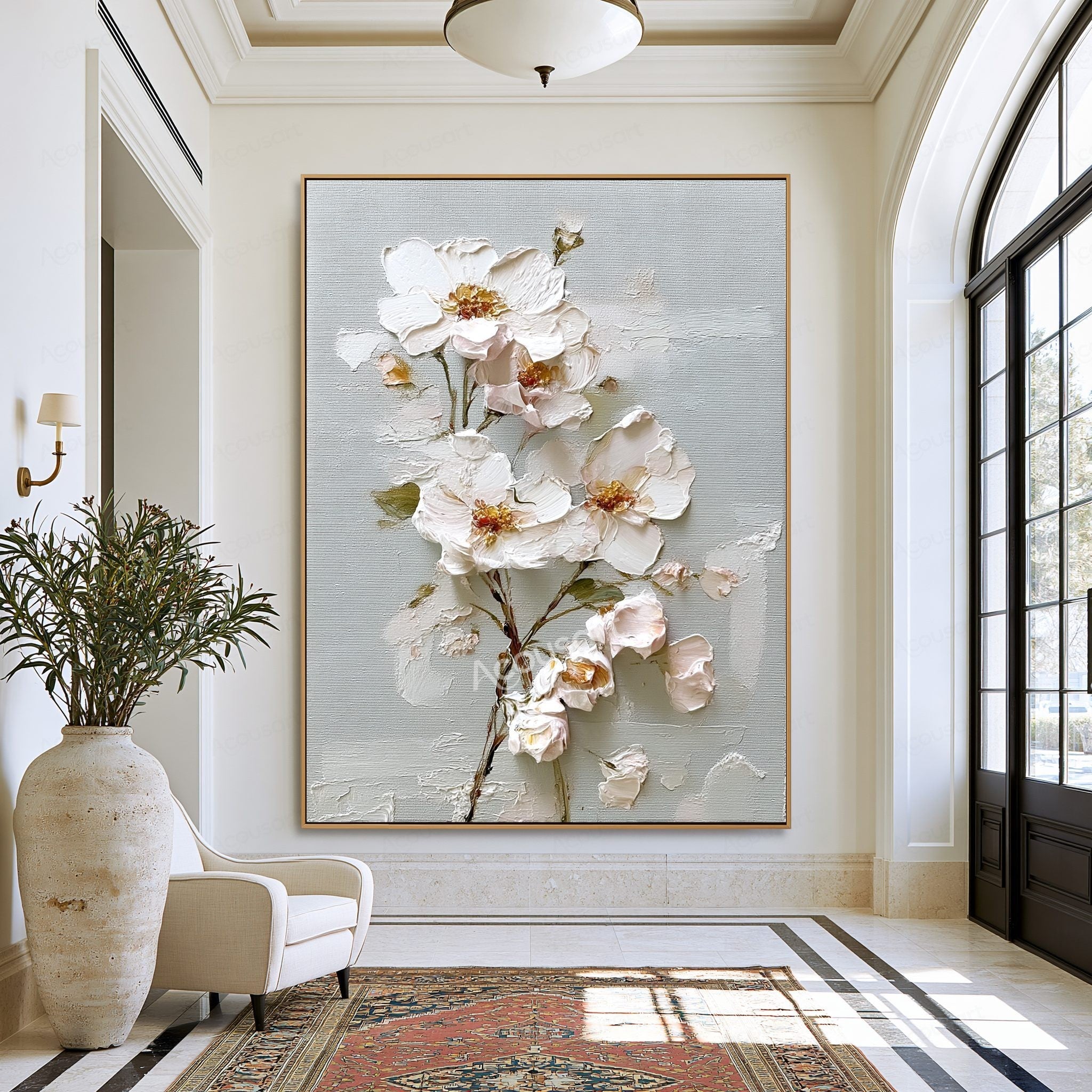 White textured floral wall art with blush flowers, gold centers, green leaves, and brown branches on a pale blue-gray background