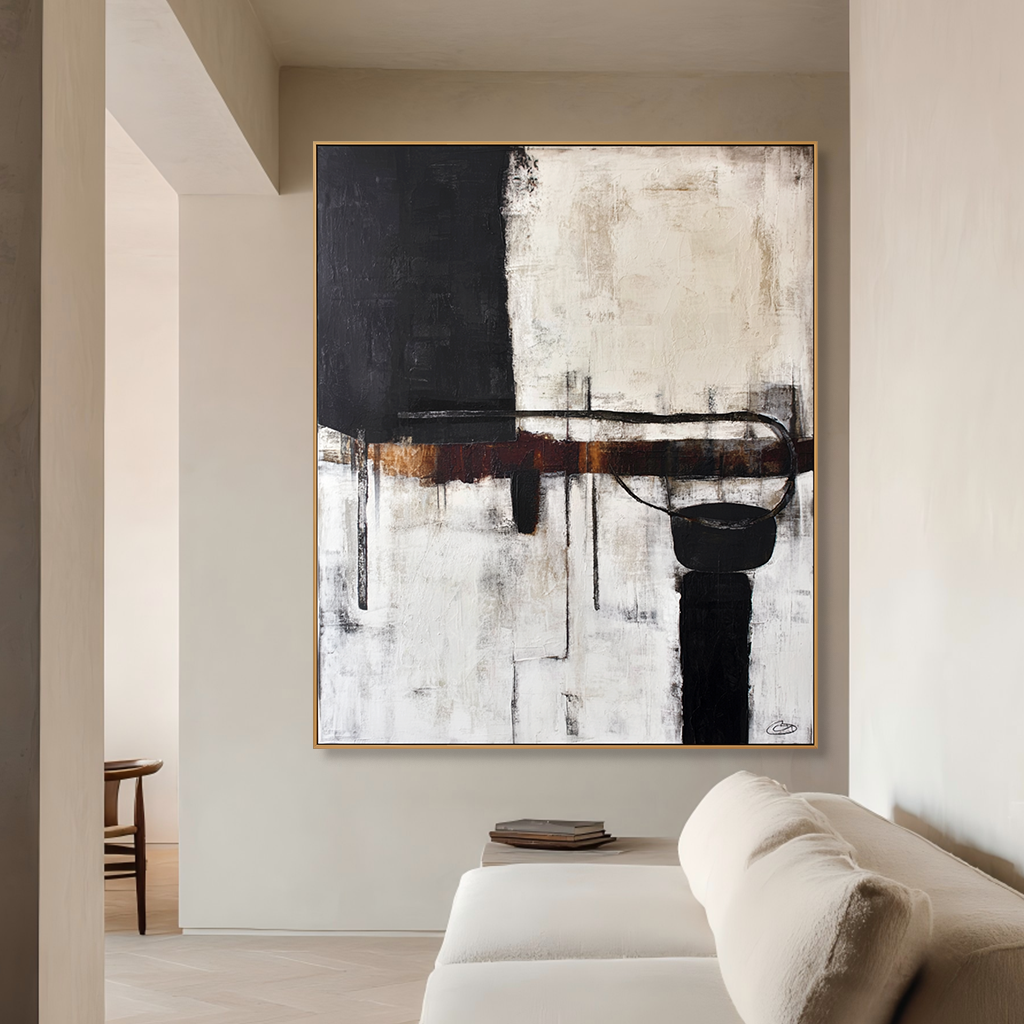 Abstract black and white art with warm brown accents and textured elements