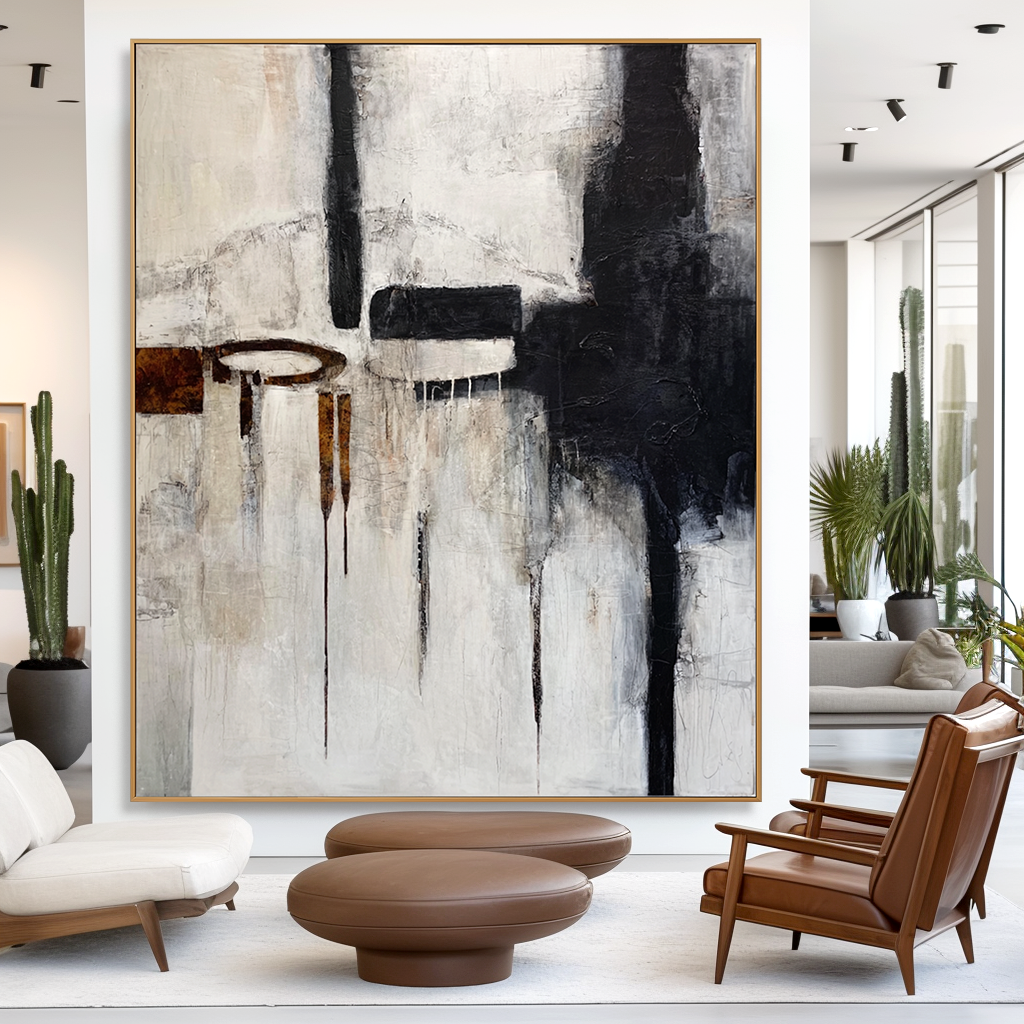 Abstract black, white, and brown geometric art with paint drips and textured elements.