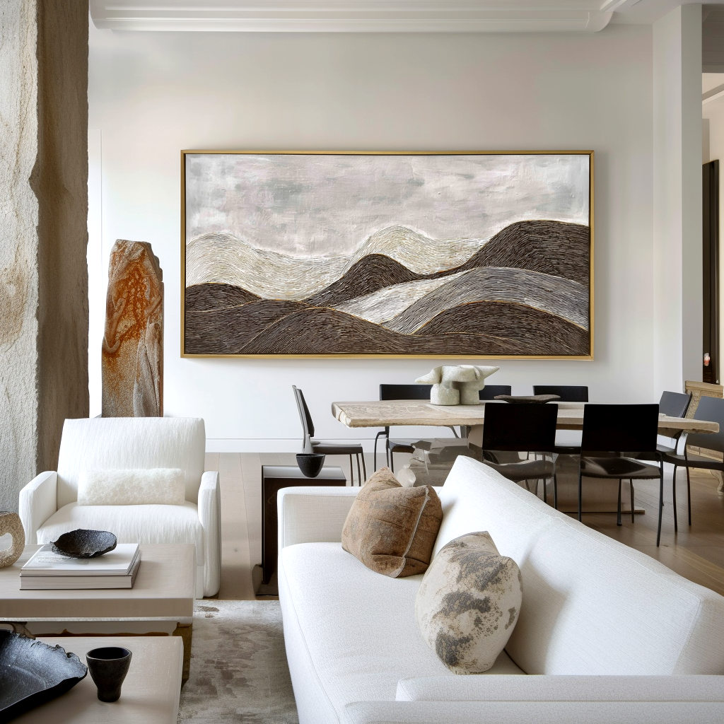 Textured black and white abstract landscape of rolling hills with soft gray tones.