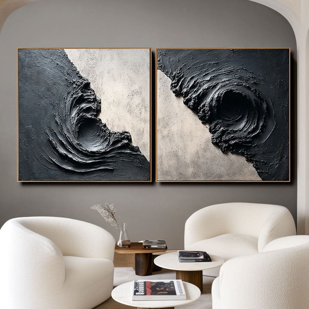 Textured abstract artwork featuring swirling black and gray tones resembling a whirlpool.