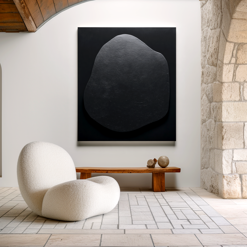 Minimalist black textured artwork with an organic shape.