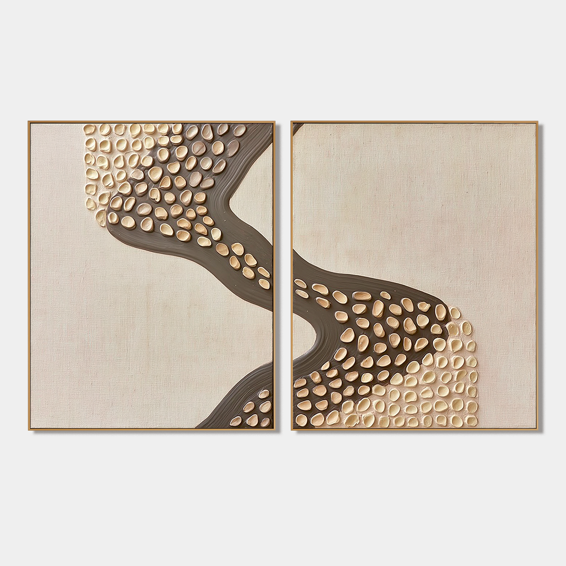 Two piece textured abstract wall art set with raised pebble shapes, dark curved flow, and neutral beige taupe tones