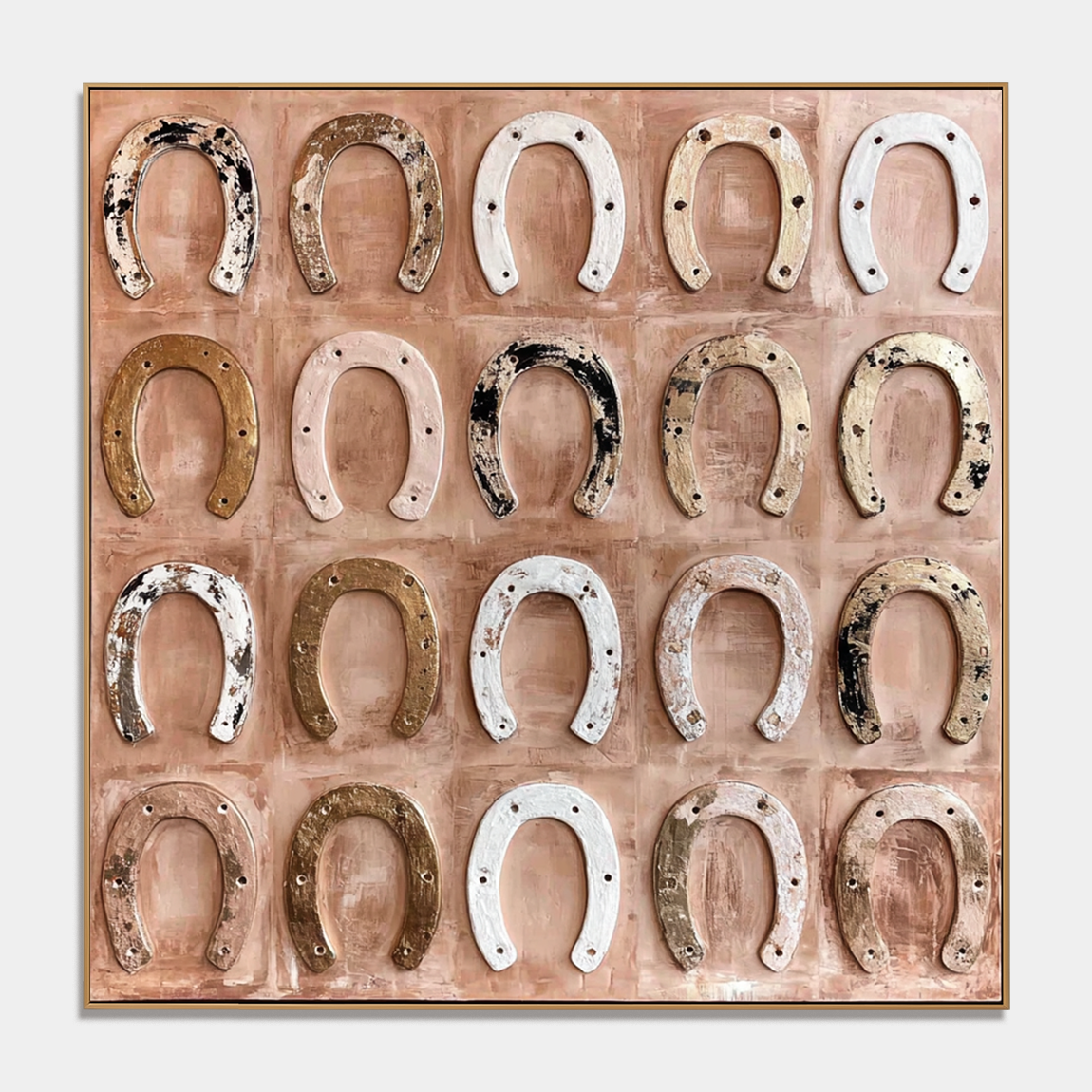 Rustic textured horseshoe wall art with vintage western horseshoes on warm blush beige background