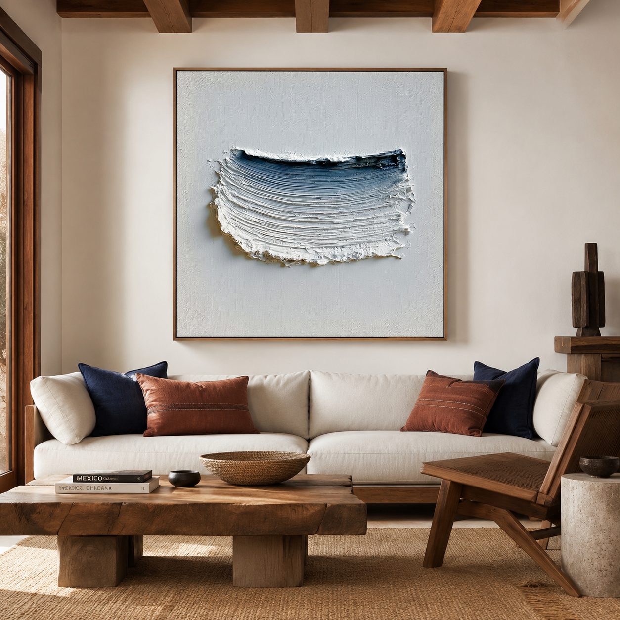 Blue textured abstract wall art with raised white brushstrokes and deep navy accent on a light neutral background