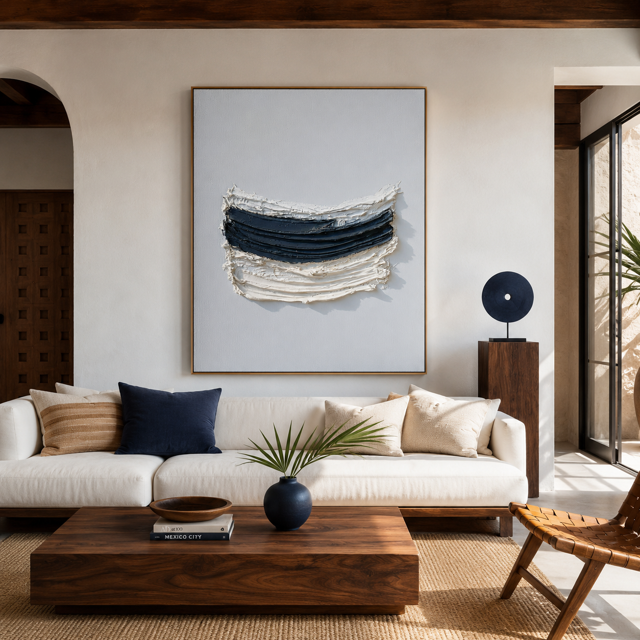 Blue and white textured abstract wall art with layered navy brushstrokes on a pale blue background