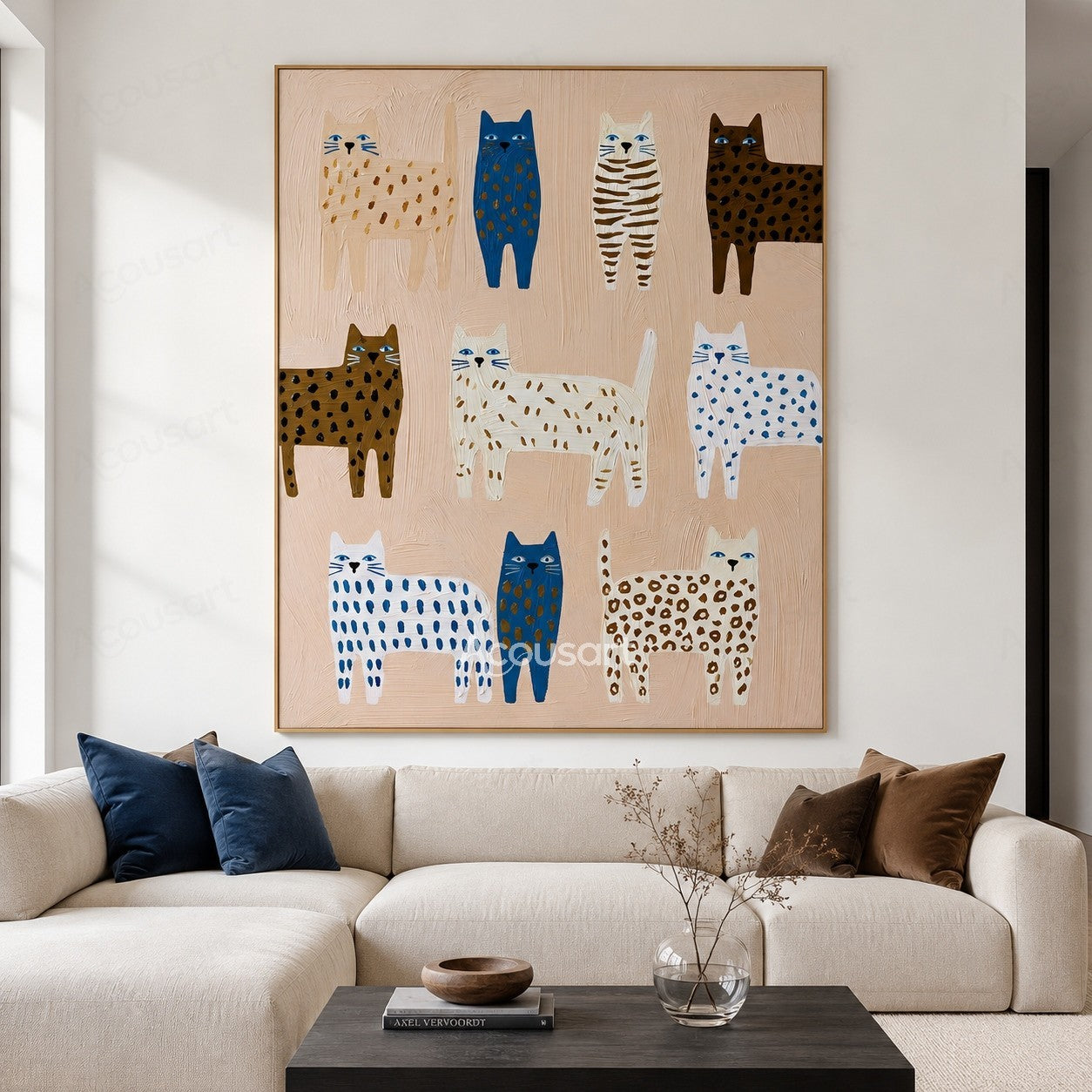 Colorful textured wall art featuring ten blue, white, brown, striped, and spotted cats on a blush beige background