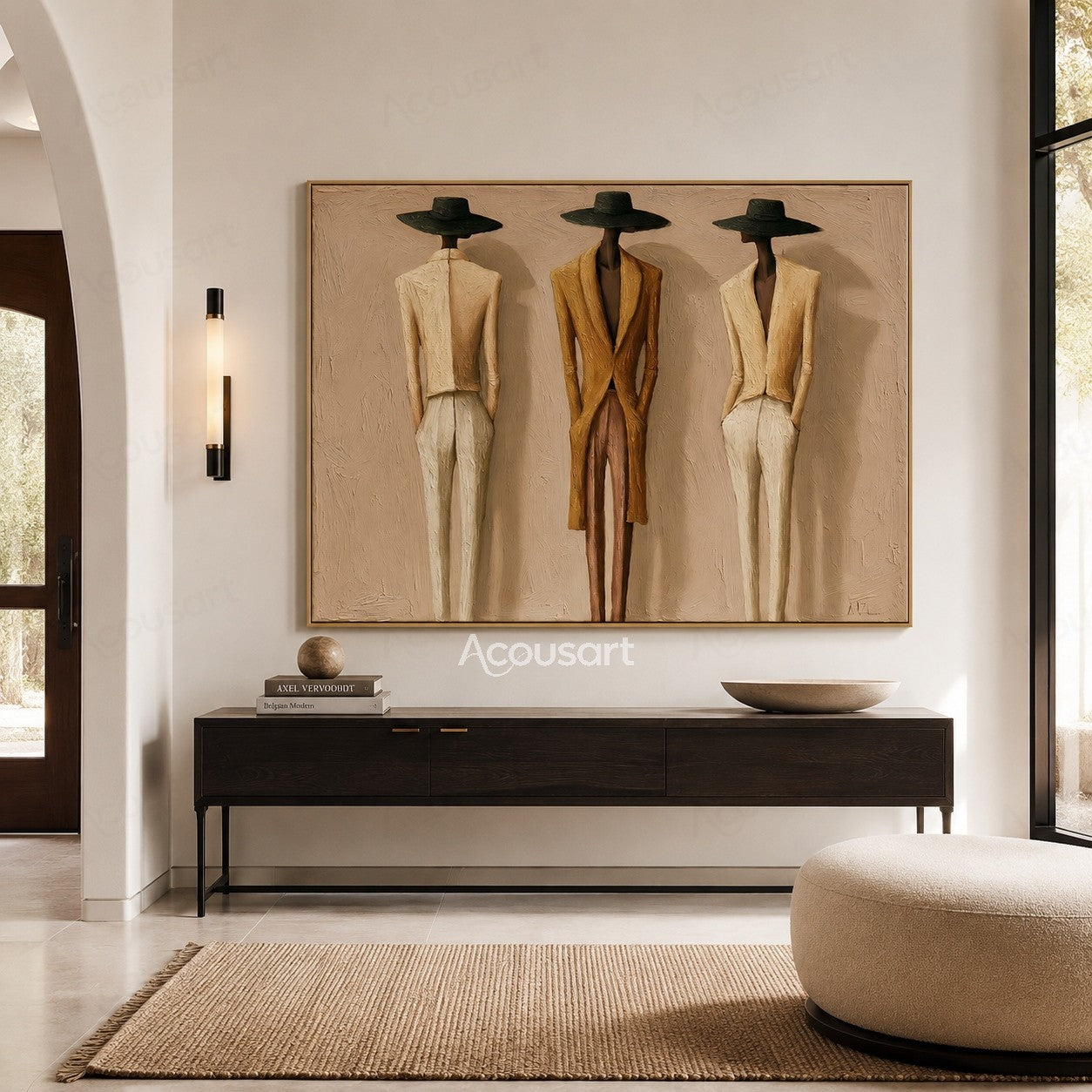 Neutral figurative wall art featuring three tall fashion figures in black hats, cream suits, and a golden-brown coat