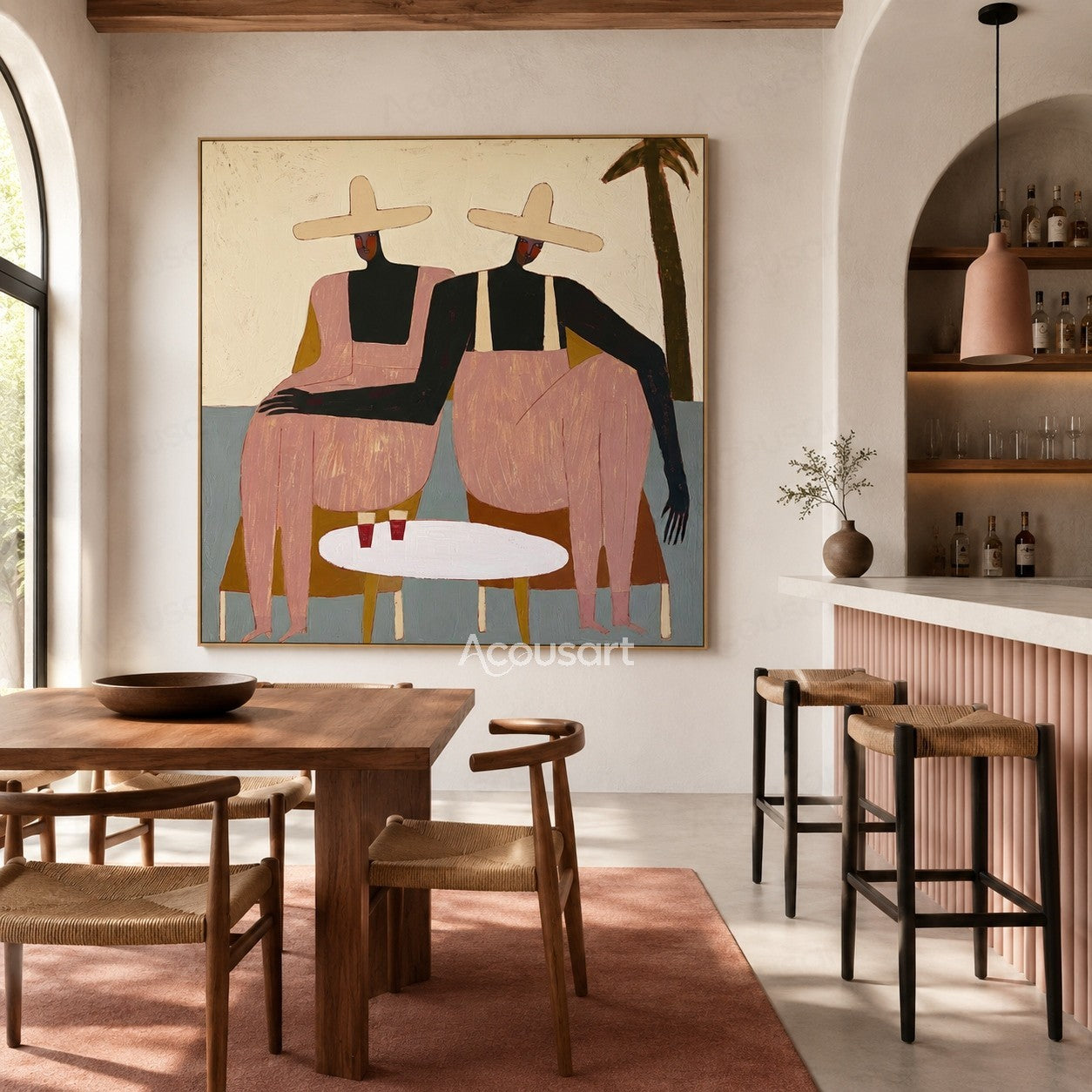 Contemporary figurative wall art of two women in cream sun hats and pink outfits seated beside a white table with drinks and a palm tree