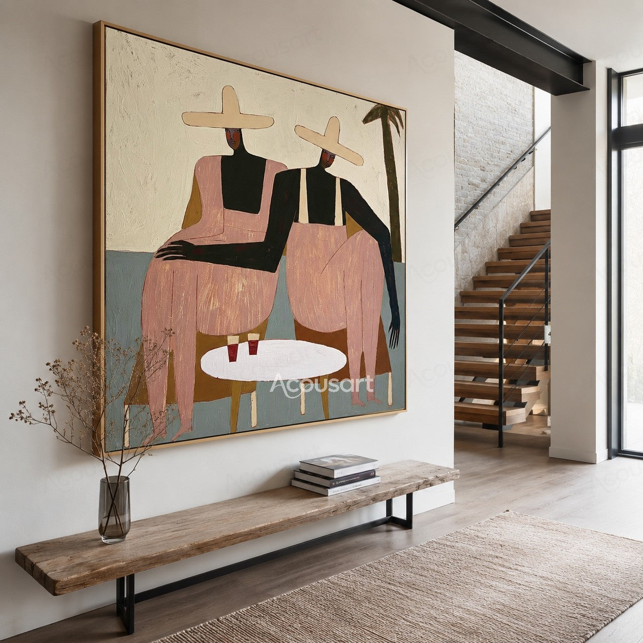 Contemporary figurative wall art of two women in cream sun hats and pink outfits seated beside a white table with drinks and a palm tree