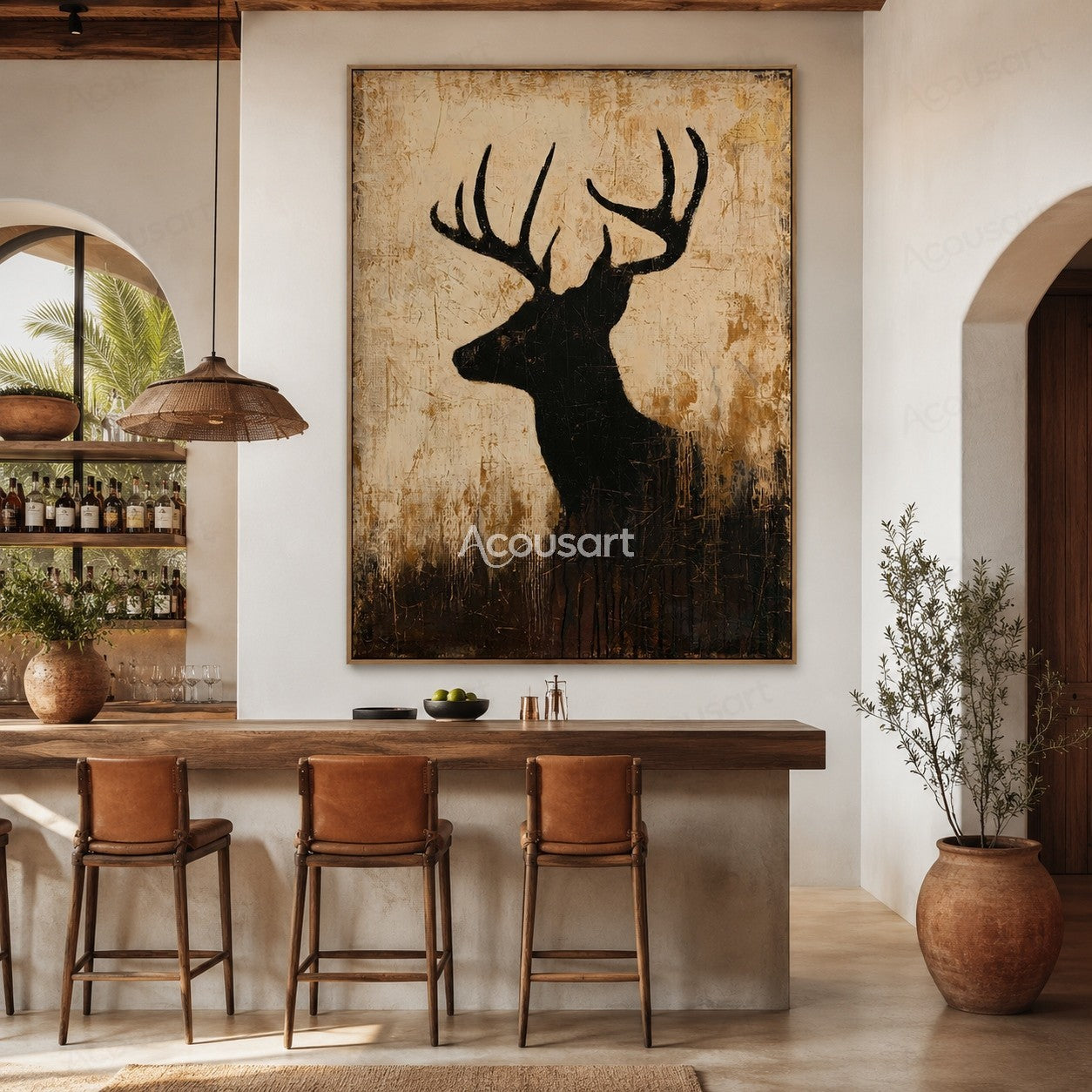 Black deer silhouette wall art with large antlers on a textured beige and brown background
