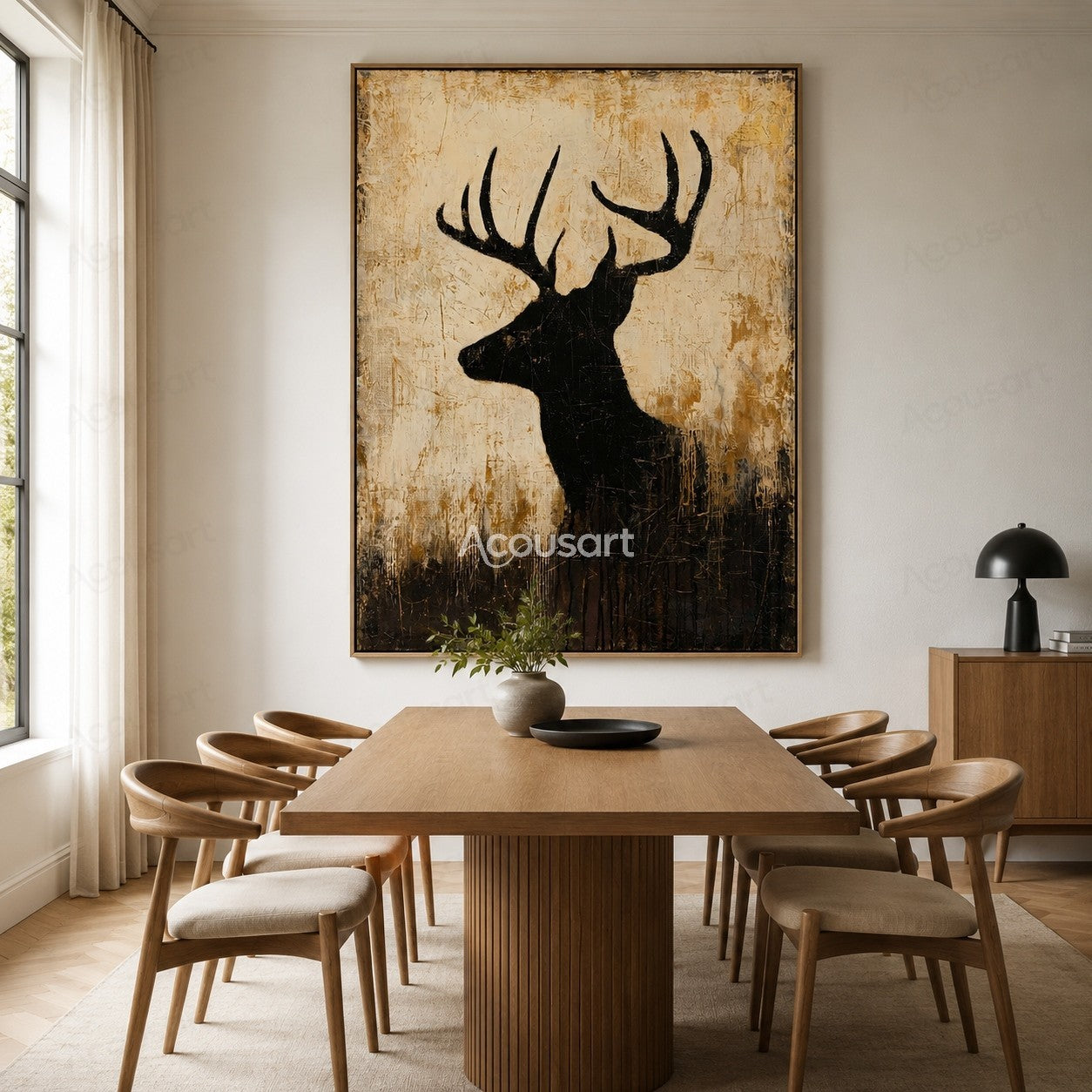 Black deer silhouette wall art with large antlers on a textured beige and brown background