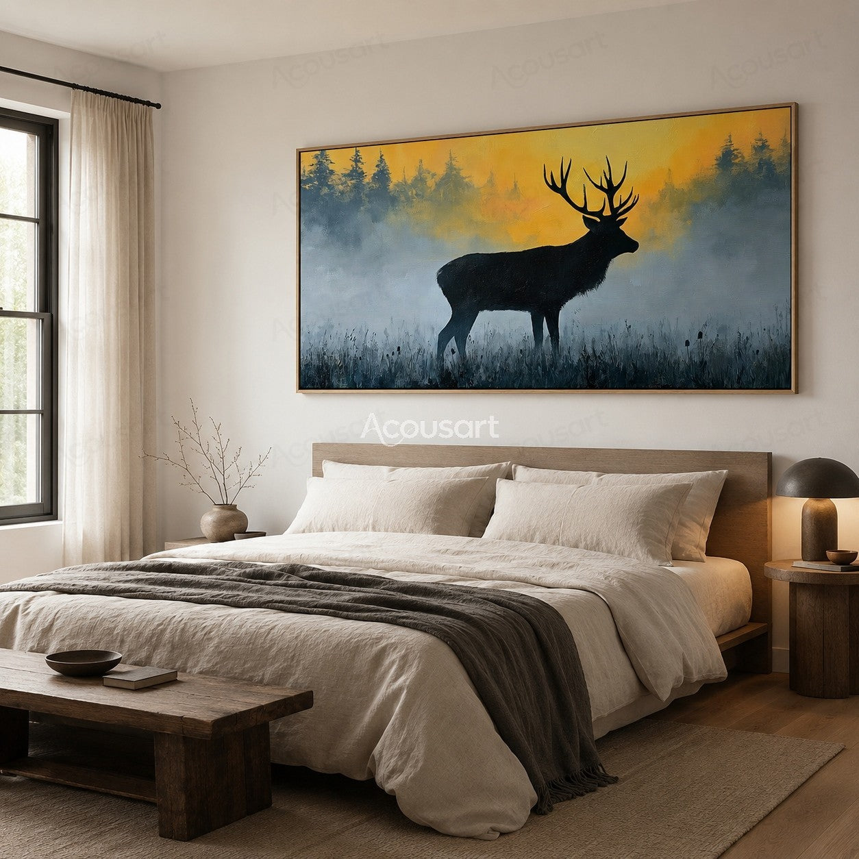 Black stag silhouette in a misty field with golden sunrise and forest background