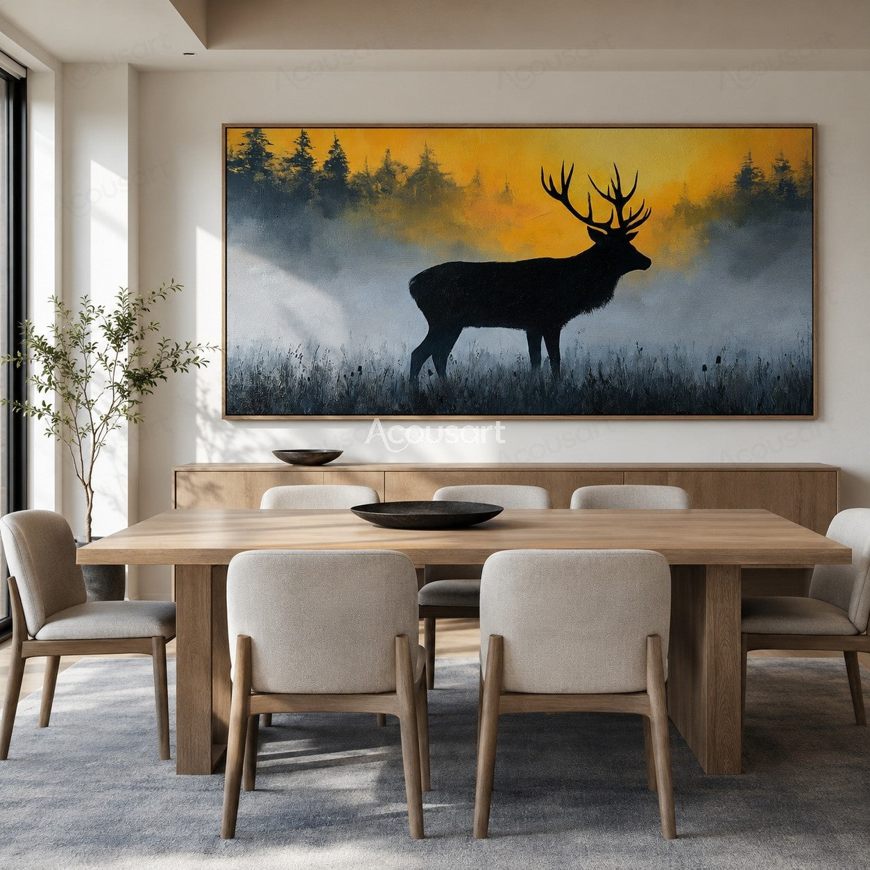 Black stag silhouette in a misty field with golden sunrise and forest background
