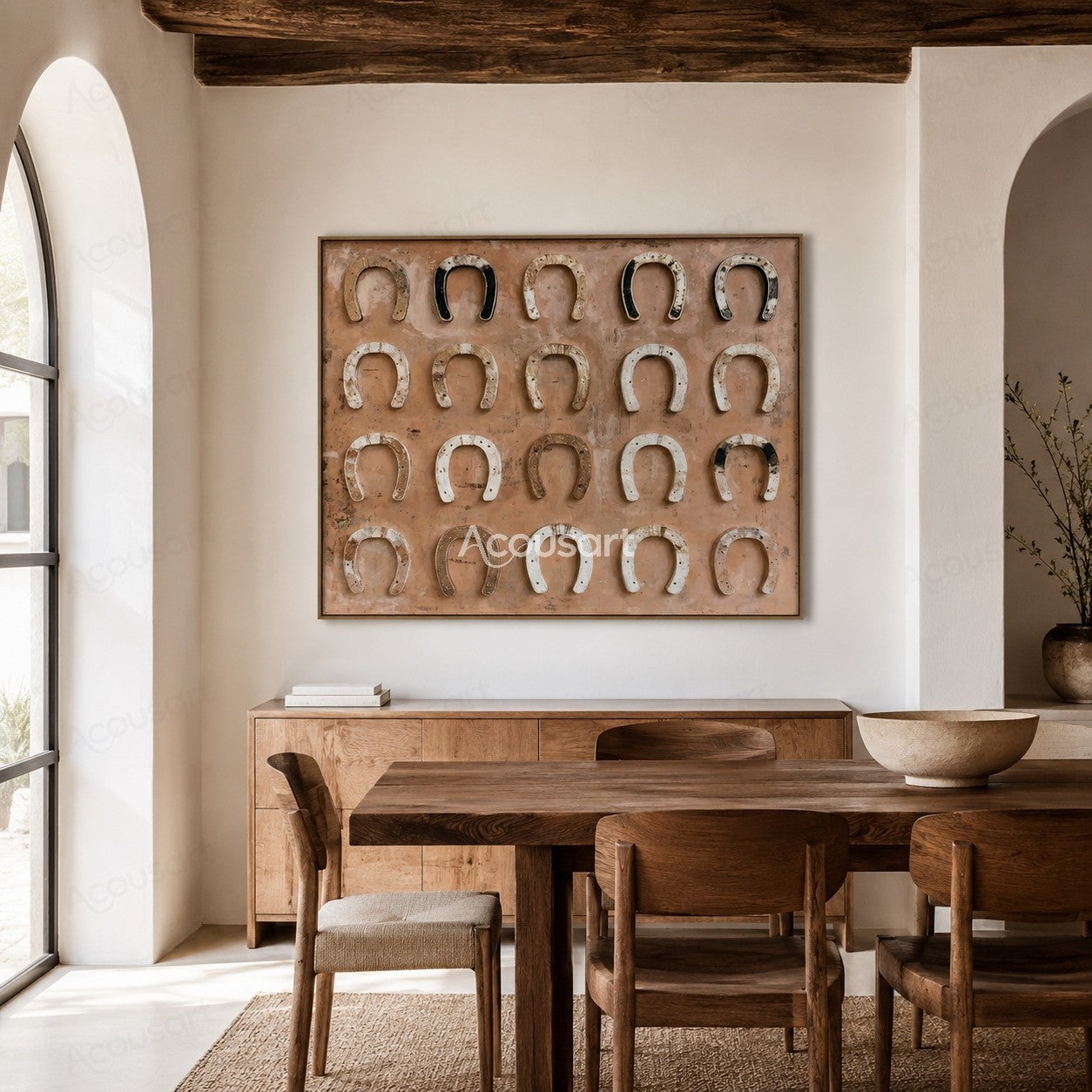 Western horseshoe wall art with vintage horseshoes on a soft peach background