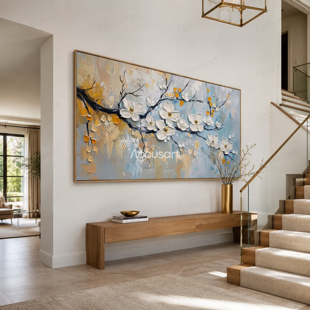 Textured white blossom wall art with dark branches, gold accents, and soft blue background