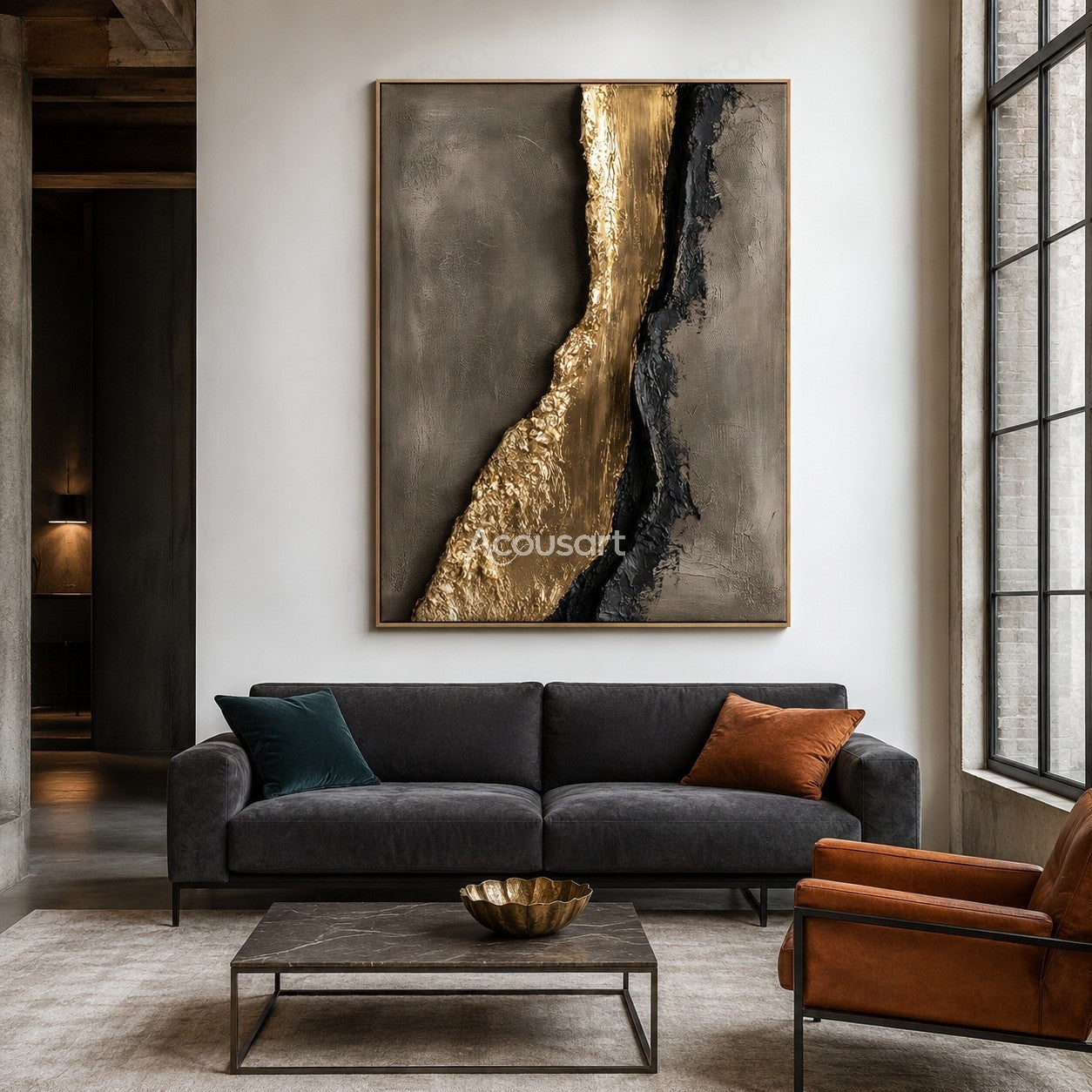 Gold and black textured abstract wall art on a gray background with raised metallic details