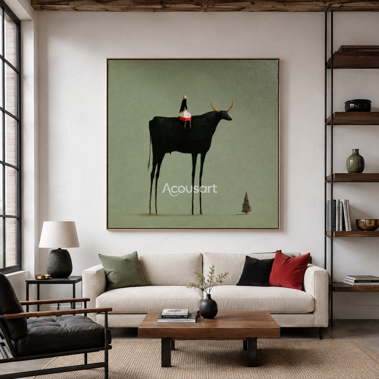 Minimalist western wall art featuring a black longhorn cow with small rider on a sage green background