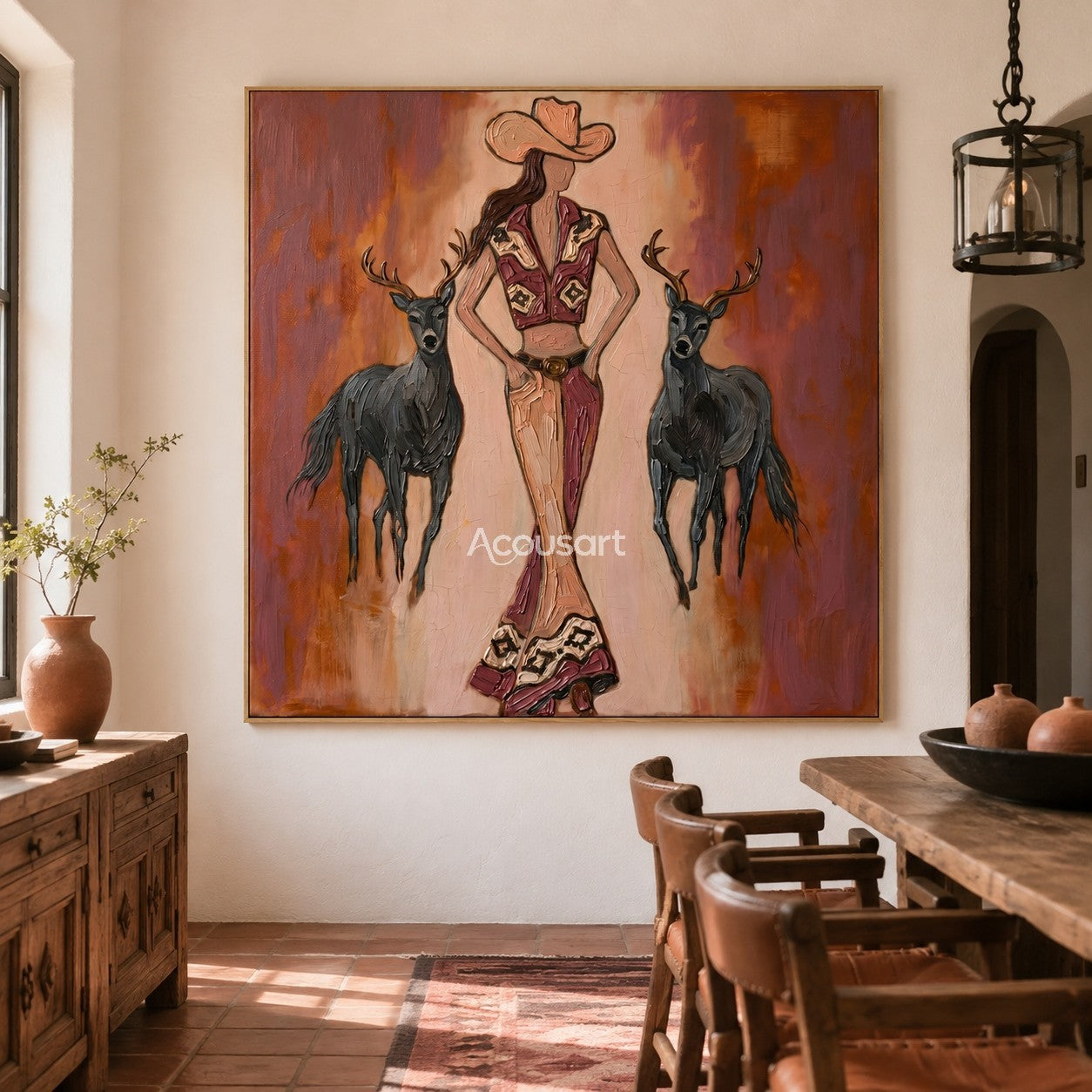 Textured western cowgirl wall art featuring a woman in bell-bottom pants standing with two black deer against a warm orange background.